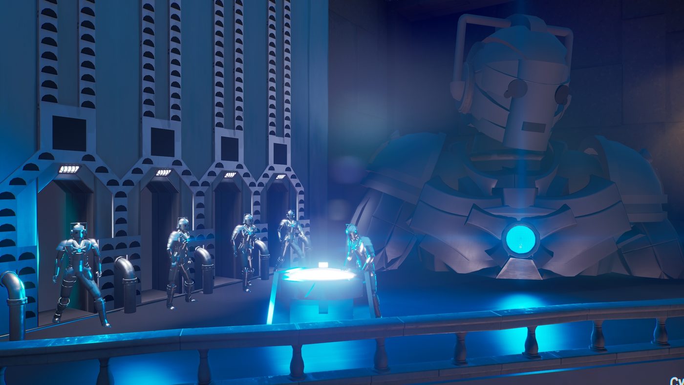 A blue-lit gallery of Cybermen in alcoves, with a giant Cyberman head and torso behind them